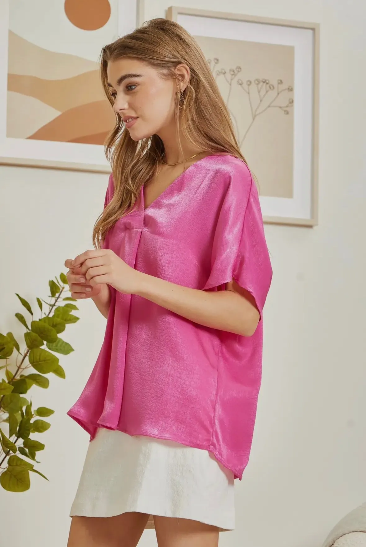 Hot pink top with a v-neckline