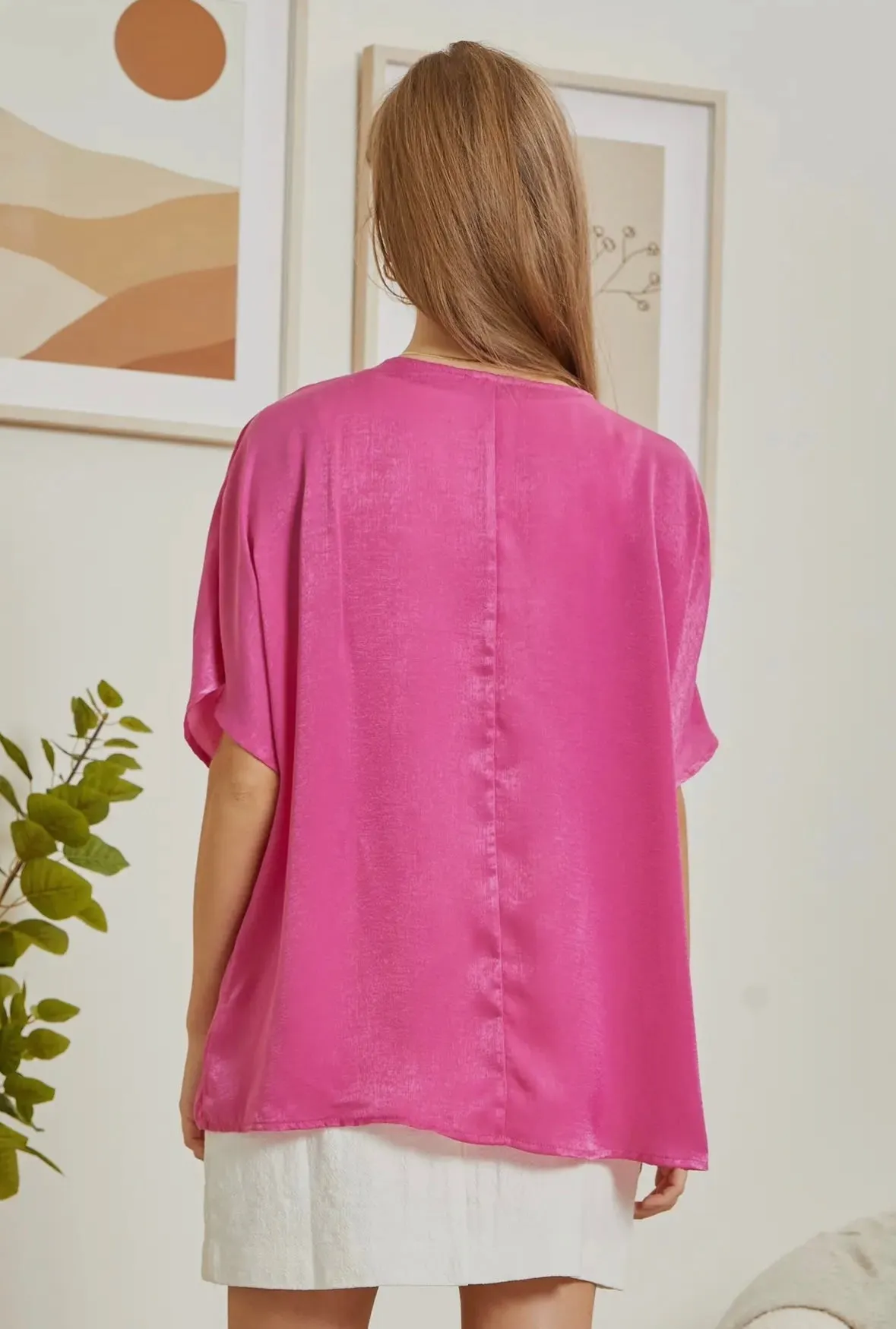 Hot pink top with a v-neckline