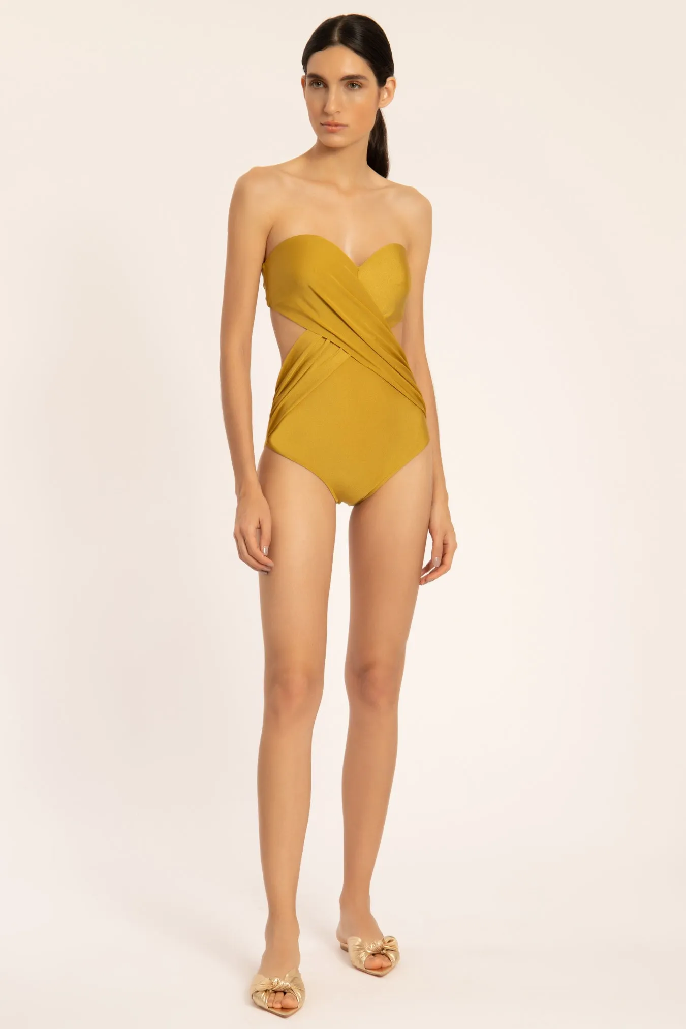 SOLID STRAPLESS SWIMSUIT WITH CUT-OUTS